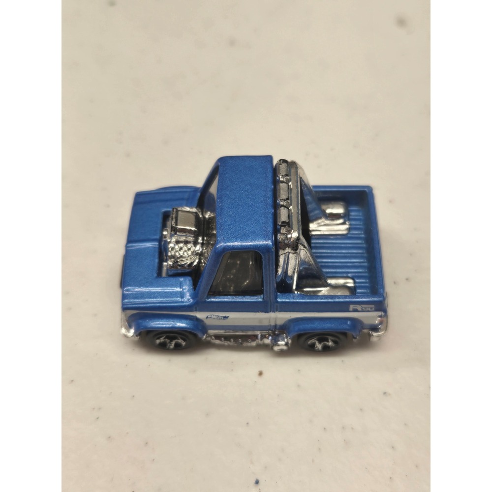 Hot Wheels Toon'd 83 Chevy Silverado Blue Metallic Diecast Truck HCT26 2021